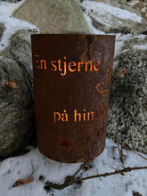 Kirkegårdslygte Tekst: En stjerne på himlen er tændt