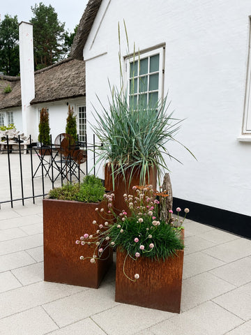 Blomsterkrukker cortenstål, høj smal model