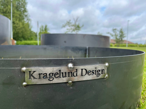 Bedring i cortenstål, runde udgaver i flere højder.